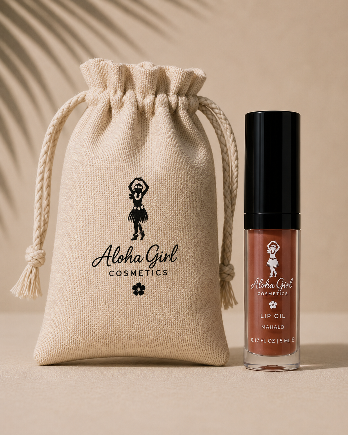 Aloha Girl Lip Oil in Mahalo beside its drawstring pouch